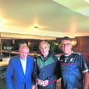 Michael Burke  Langton’s Hotel on John Street with proprietor Eamon Langton on the left and Kilkenny hurling legend, Liam ‘Chunky’ O’Brien (centre)