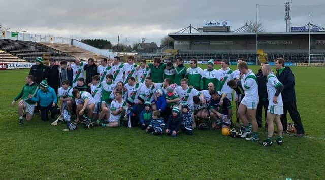 The Tullaroan players celebrate winning the Leinster Intermediate Club hurling title