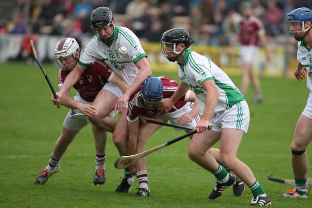 Mark Bergin(right) was the top scorer for O'Loughlin's with nine points