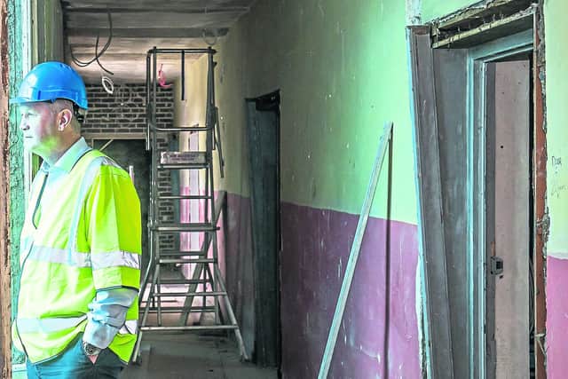 Having acquiesced to my request to take a look at the work in progress, Kilkenny City Senior Engineer, Simon Walton, Project Manager for the development, insisted that photographer, Pat Moore and I, don work hats and wear steel-toed boots before entering the site.