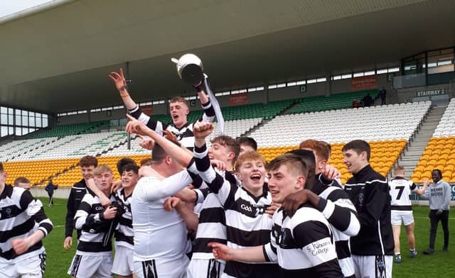 St Kieran's college players carry team captain, Conor Murphy shoulder high