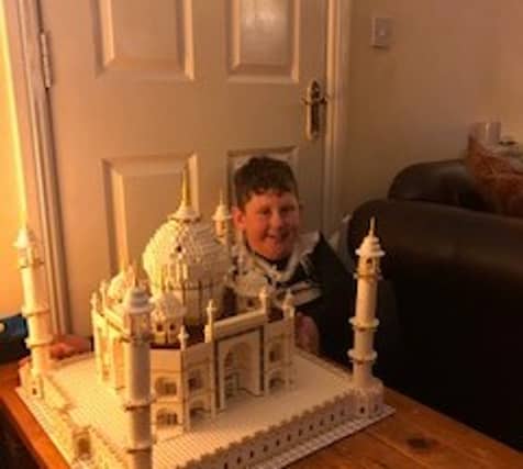 Cormac Foxe with his completed LEGO kit of the 6,000 piece Taj Mahal