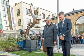 British Ambassador Robin Barnett and Australian Ambassador Richard Andrews at the opening of The Kilkenny Famine Experience in MacDonagh Junction - the sculpture can be seen in the background.