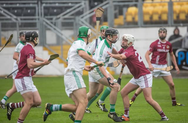 Dicksboro's Conor Doheny stops an O'Loughlin Gaels attack. Photo Pat Moore
