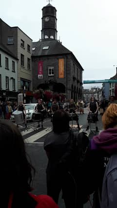 Crowds gathered to watch the drummers on High Street at lunchtime today