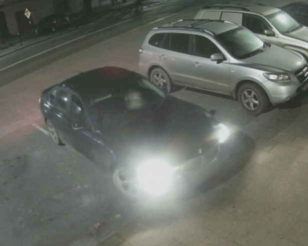 The Black BMW car involved in the burglary 