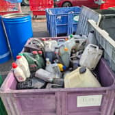Waste oil containers are being safely deposited for collection on Household Hazardous Waste Collection Day. PICTURE: My Waste