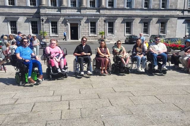Campaigners including David McInerney and Emily Felix at Leinster House on Tuesday