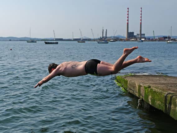 Eamon McCormack O'Connell going for a morning swim in Clontarf, Dublin, in June