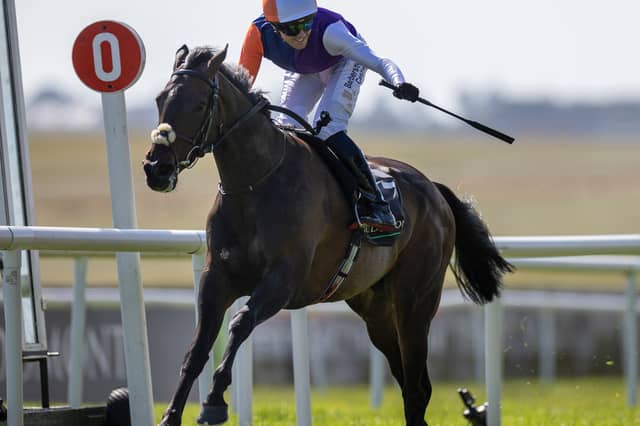 Johanna Walsh with Dylan Browne McMonagle winning the Irish Oaks at the Curragh.