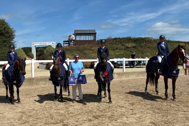 Representing Warrington Pony Club at the Irish Pony Club National Festival were Mia Rowe, Jilly Hoban, Anna Moloney, and Emily O'Keeffe (under the guidance of Chef d'Equipe Eddie Moloney)