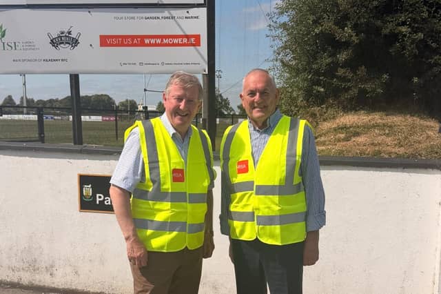 Minister Seán Canney and John McGuinness TD outside Kilkenny Rugby Club