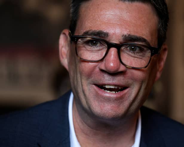 Andy Burnham laughing
