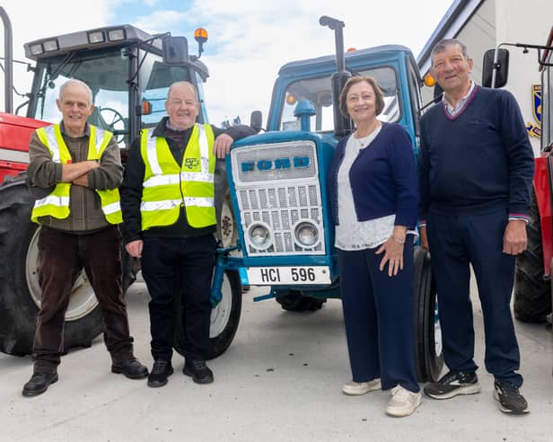 Joe Crennan, Cllr John Brennan, Bridget Kelly and James Hennessy with John's 1974 Ford 2000 at St Patrick's NS (Clogh) for the launch of the Clogh Monster Tractor Run