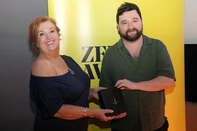 Mary Kate O’Flanagan presenting the award to John Morton