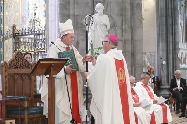 Pictured is Bishop Niall Coll presenting the crosier to Bishop Nash on Sunday during the ceremony in St Mary's Cathedral Kilkenny