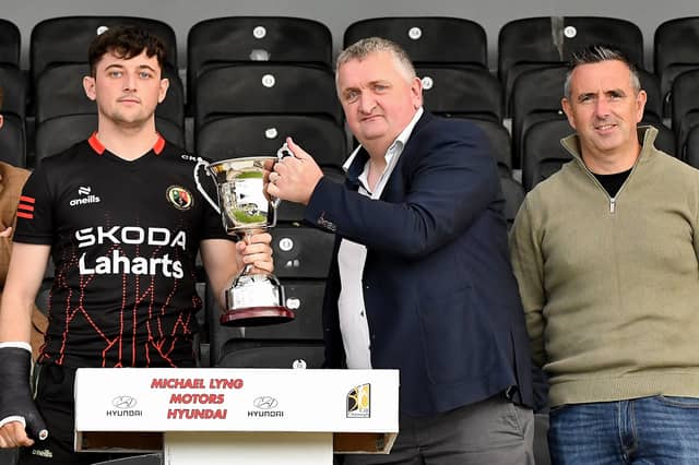 James Stephens captain Cian Kenny receives the Intermediate League Trophy