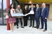 Minister of State Browne presenting key to Staff of Aurora Disability Services who support residents of Group Residential Home in the development