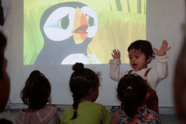 Children in Gaza enjoying a screening of Puffin Rock (produced by Kilkenny animation studio Cartoon Saloon)