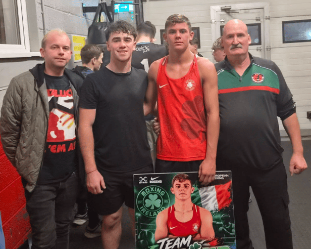 Cllr Maurice Shortall (left) pictured at the homecoming for boxer John Delaney (in red) earlier this week alongside Pat Stokes (right)