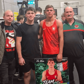 Cllr Maurice Shortall (left) pictured at the homecoming for boxer John Delaney (in red) earlier this week alongside Pat Stokes (right)