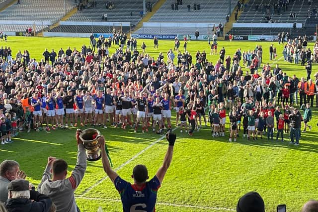 James Stephens captain Cian Kenny and Niall Delaney lift the cup after Sunday's win