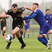 Callum Warfield of CK United in action against Ethan Mills of Newbridge Town during the FAI National League game earlier this season.