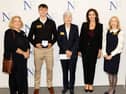 School principal Emma Raughter, winning Kilkenny scholar Ted Crowley from Kilkenny College, Carmel Naughton, Minister for Health Jennifer Carroll MacNeill TD and Aoife Ahern from UCD at the 2026 Naughton Foundation Scholarship awards held at Trinity Business School, Trinity College Dublin