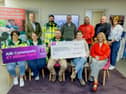  David Tighe CEO CRITICAL; Tadhg O'Shea CRITICAL CFR Kilkenny responder; Jason Dempsey AIB; Edward Walsh and Donnie Lucey CRITICAL; and Cathriona Murphy AIB. Front from left are Anne Reilly, Kathleen O'Carroll and Stephen Happe, CRITICAL CFR Kilkenny responders with Robyn Kehoe and Eabha Heffernan AIB. Picture Dylan Vaughan  