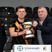 Conahy captain Ciaran Rice receives the junior trophy from Pj Kenny (Chairman) and Paul Kavanagh (Sponsor).