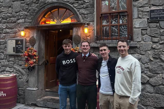Irish cycling stars Dillon Corkery, Eddie Dunbar and Sam Bennett pictured during their visit to Kyteler's Inn in Kilkenny with Director of Kyteler’s Inn, JD Flynn