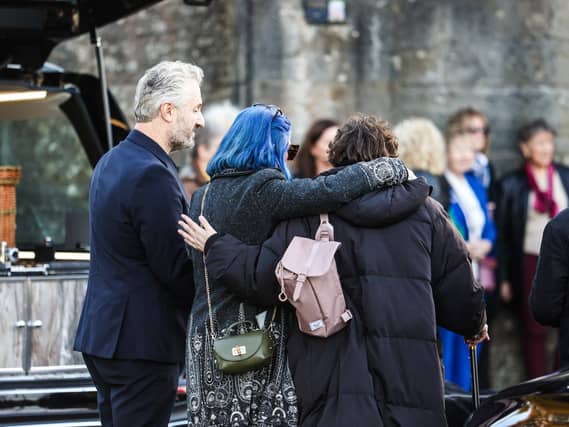 Mouners at Donal Lunny's funeral