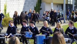 American high school rolls into Abbey Community College