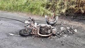 PHOTOS: Motorcycle bursts into flames after collision with car 