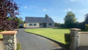 Family living on offer - bungalow with a glorious garden for sale in Johnstown
