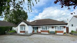 Property: 8-bed, 7-bath Kilkenny city bungalow going for a steal - click for pics!