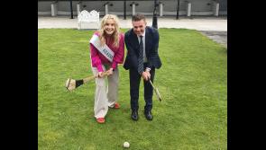 Local auctioneer Joe Coogan wishes Kilkenny Rose Lisa O'Rourke the best as she departs for Tralee