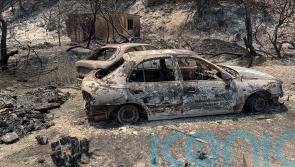 Fire still raging on Greek island of Rhodes as dozens more start across country