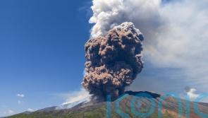 Volcano in popular summer holiday spot sends smoke and ash miles into the air