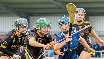 Champions Piltown march past St Brigid's and into Kilkenny Senior Camogie Final