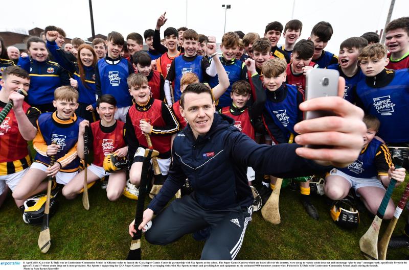 T.J. Reid goes back to school for launch of Super Games Centre 