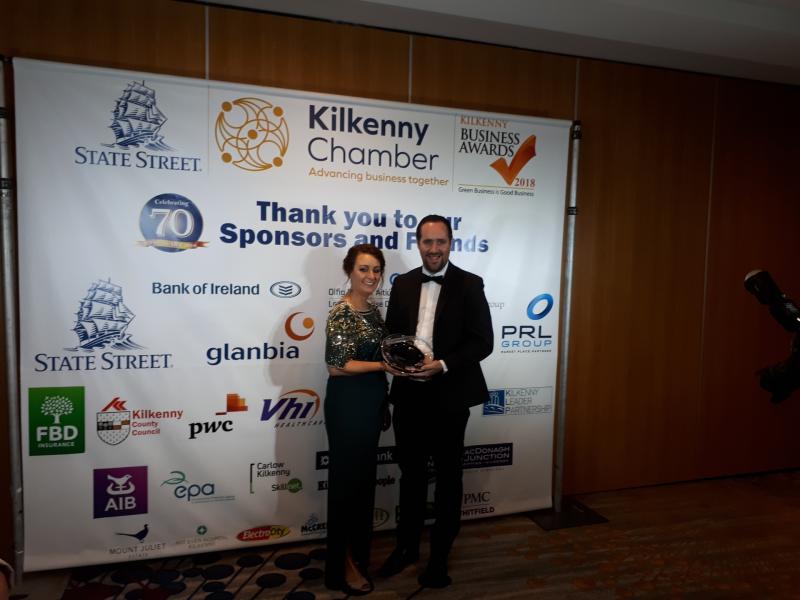 Chamber President Marion Acreman presents the overall business of the Year to Julian Hughes of Hughes Farming