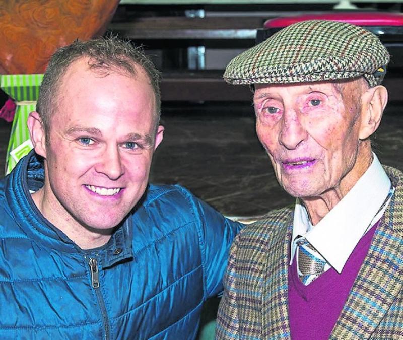 Great Kilkenny hurler and fellow Tullaroan man, Tommy Walsh, congratulating the late Dick 'The Church' Walshe at his 100th birthday party on March 16, 2018
