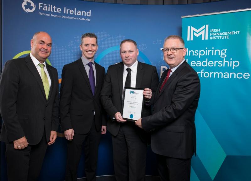 James Gleeson, (second from right),  general manager of the Hibernian Hotel, for completed the Hospitality and Tourism Strategy Management Programme