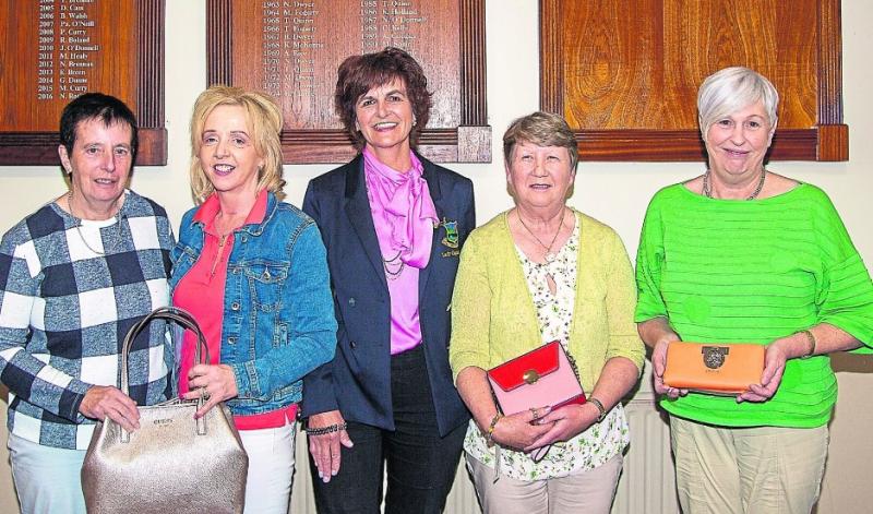 GOLF: Castlecomer players went to Portarlington in force