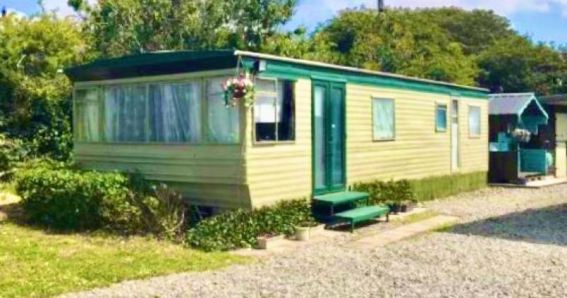 PHOTOS: Escape to the beach! Seaside holiday home for sale 