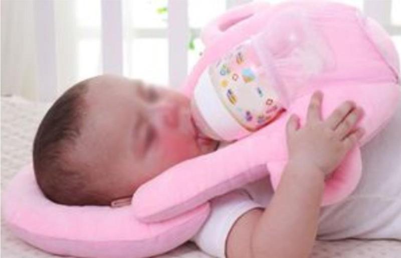 Baby self-feeding pillows taken off market due to 'risk of death or serious harm'