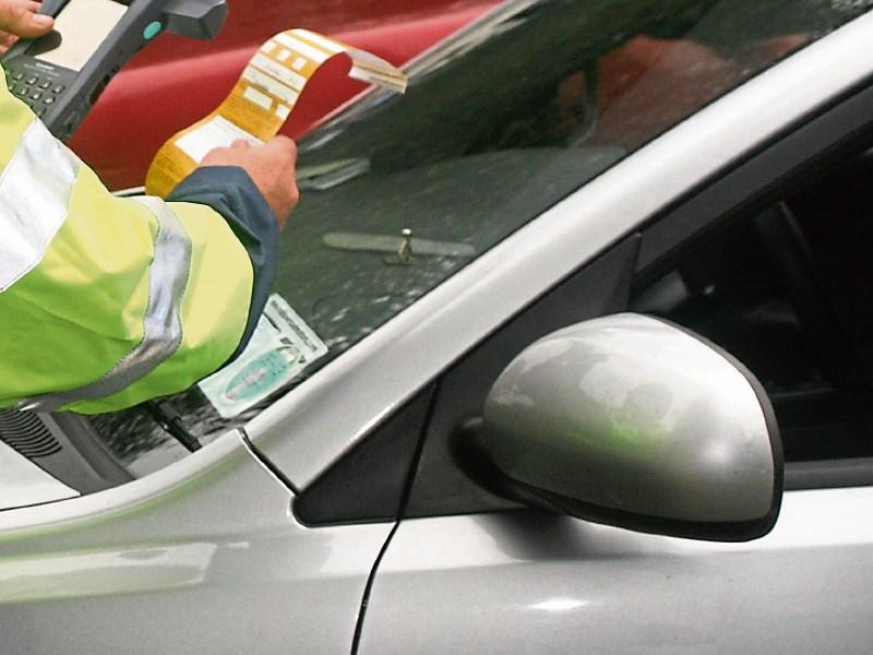 Gardai have been accused of carrying out a &ldquo;quota filling&rdquo; exercise by ticketing illegally parked cars during a funeral