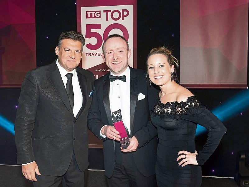  John Warr, Managing Director of Wendy Wu Tours  sponsors. and Tom Britton of Marble City Travel, winners of the award with Sophie Griffiths,  editor of the Travel Trade Gazette (TTG)