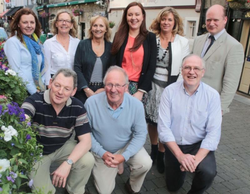 St Kieran's Street traders last Thursday. Pictured are (back): Rita Brennan, Nicky Flynn, Liz Walsh, Siobhan Forrest, Sally Hennessy and David Fitzgerald. Front: Martin Crotty, Sean Leahy, Kieron Bollard. Photo: Pat Moore.